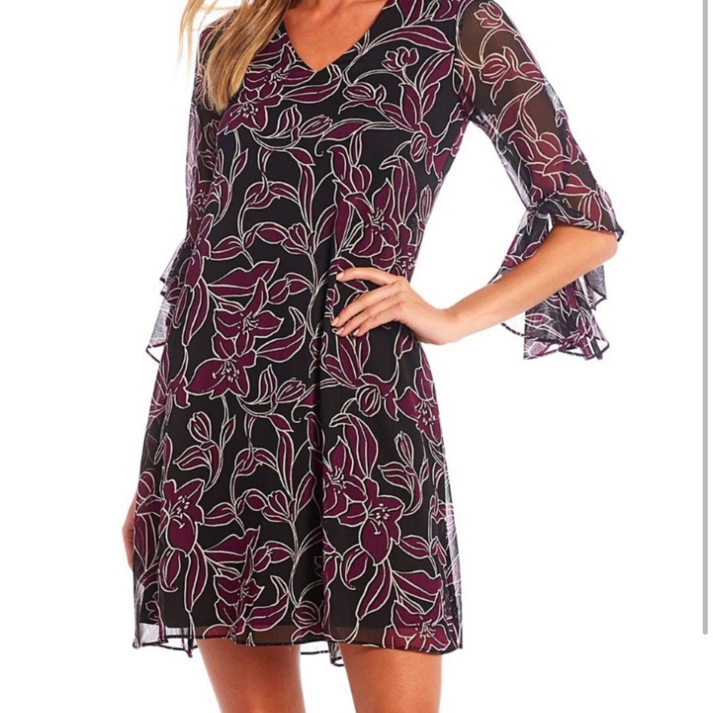 Calvin Klein ruffle sleeve fully lined dress. NWT . Retail 139